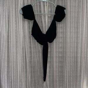 A black Bandeau with a tie in the front